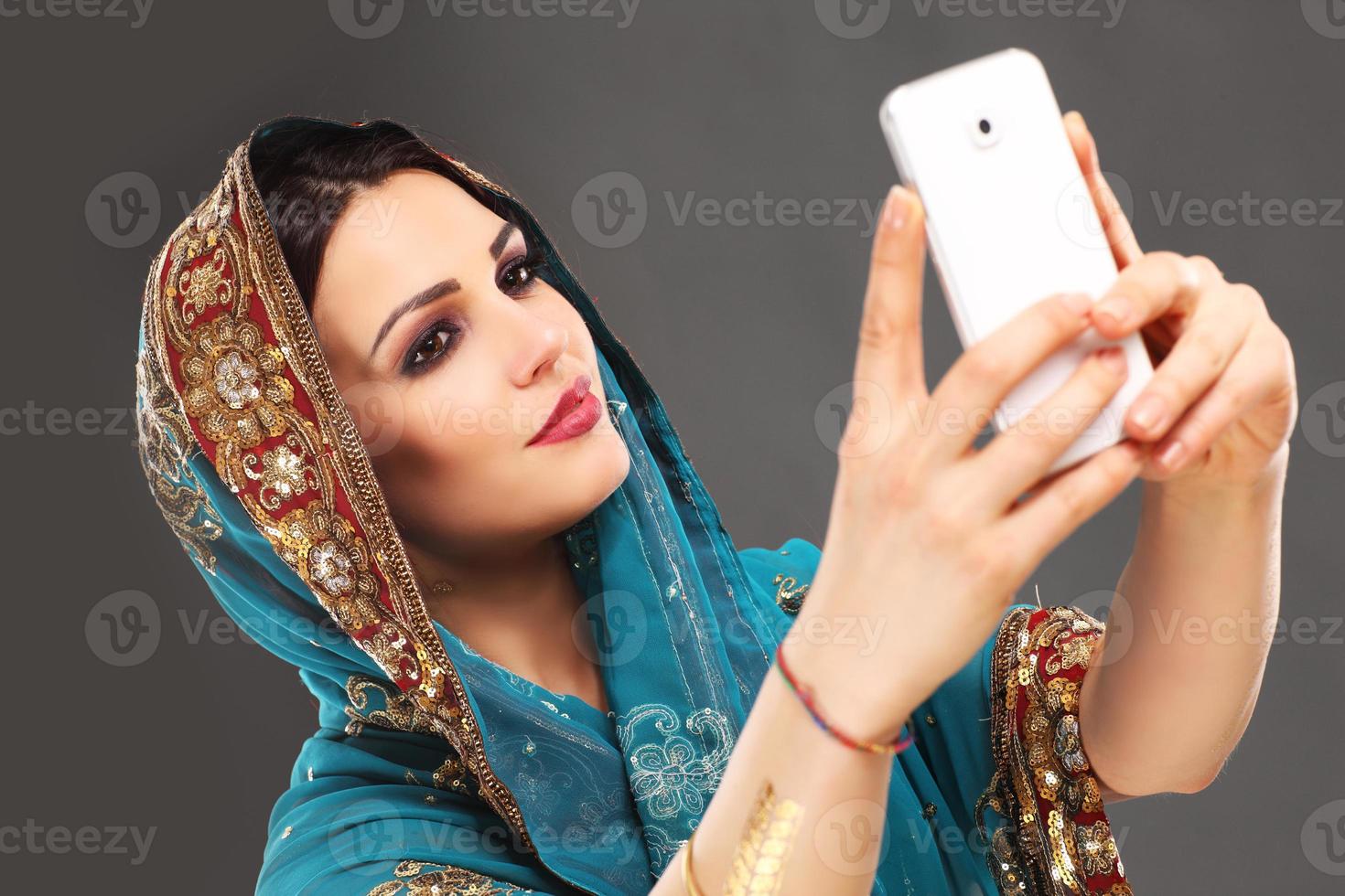 Arabic woman taking selfie photo