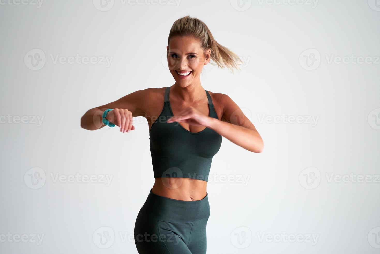 Adult woman practising yoga at home photo