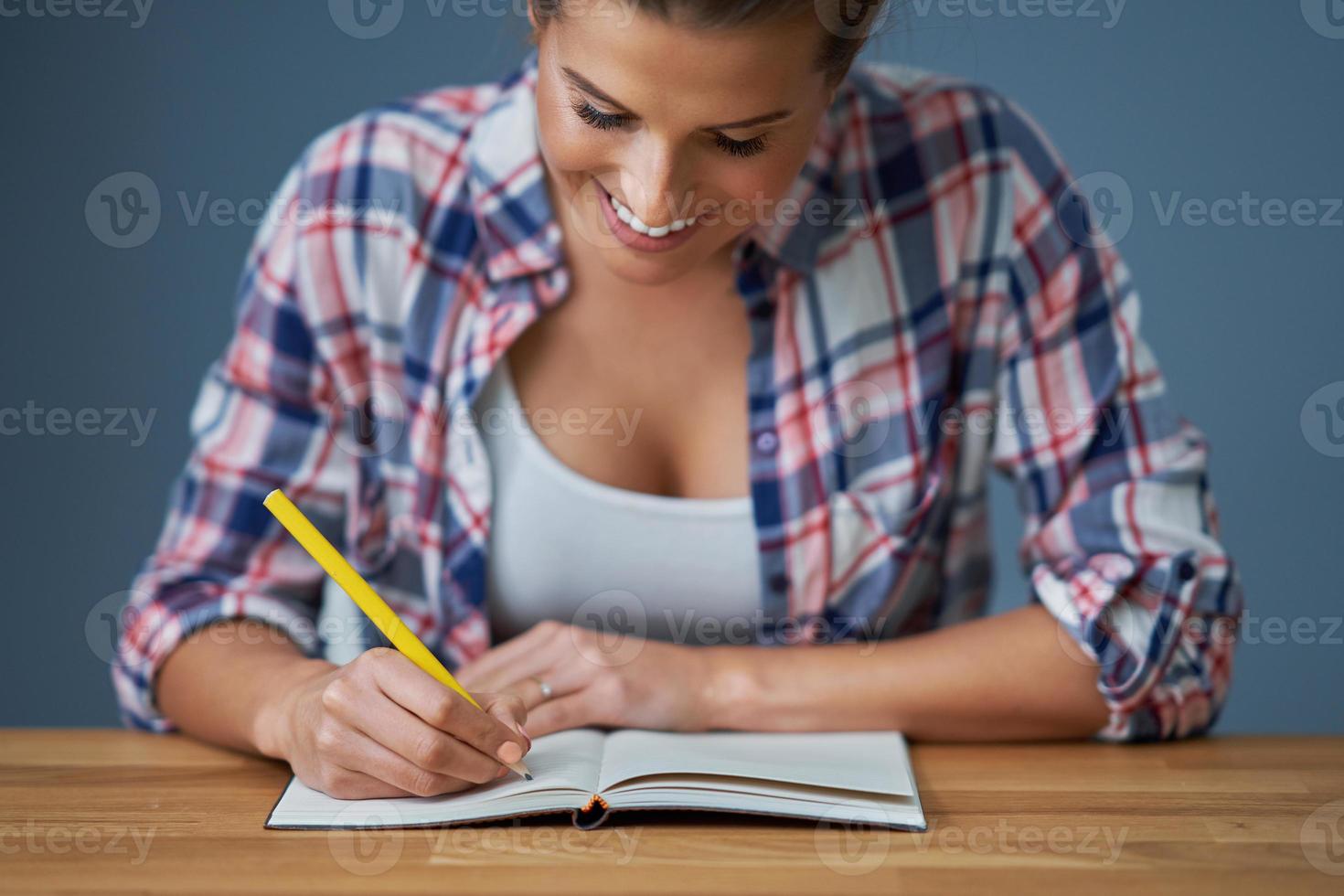 Female student learning at home photo