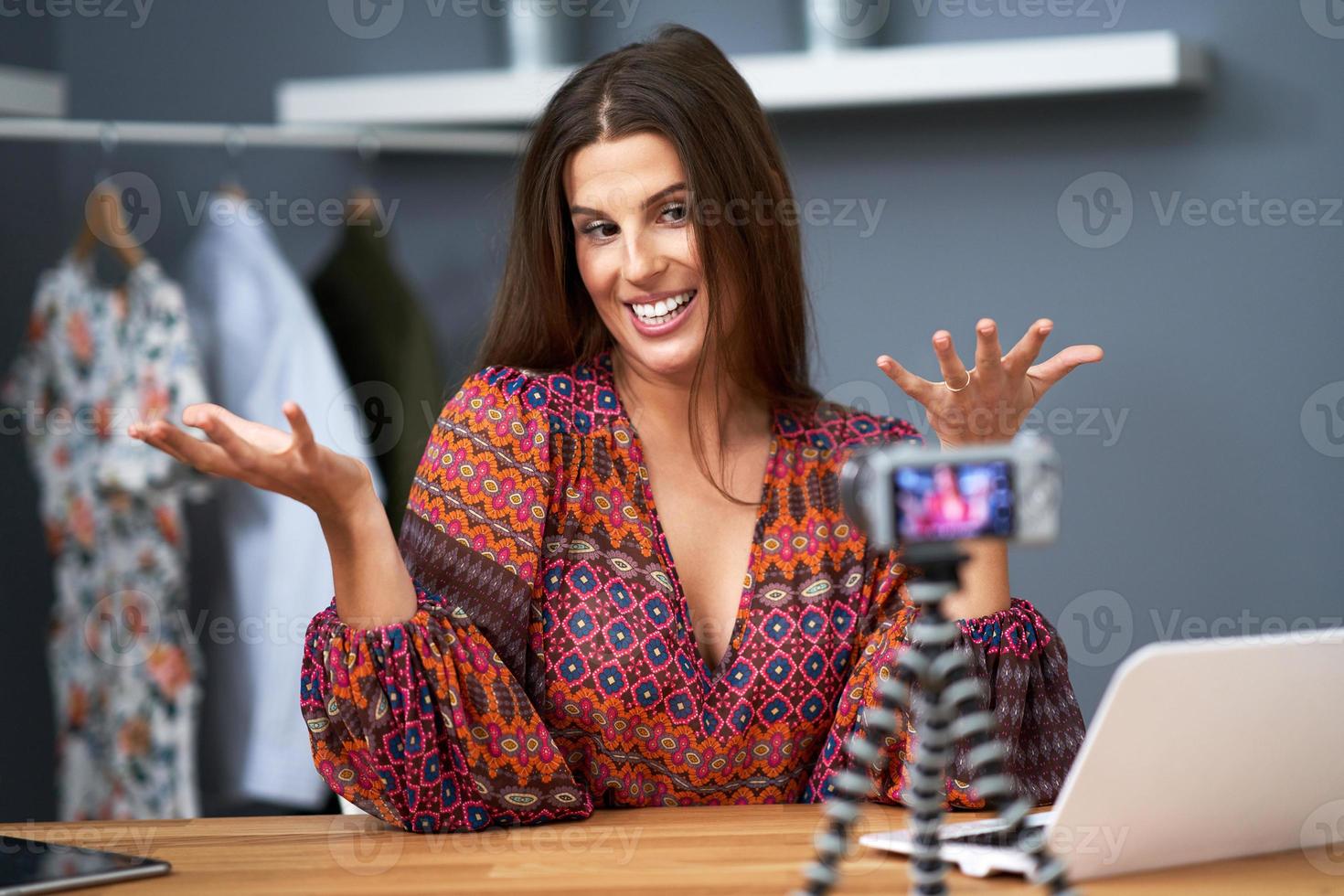 Fashion vlogger influencer recording live tutorial video photo
