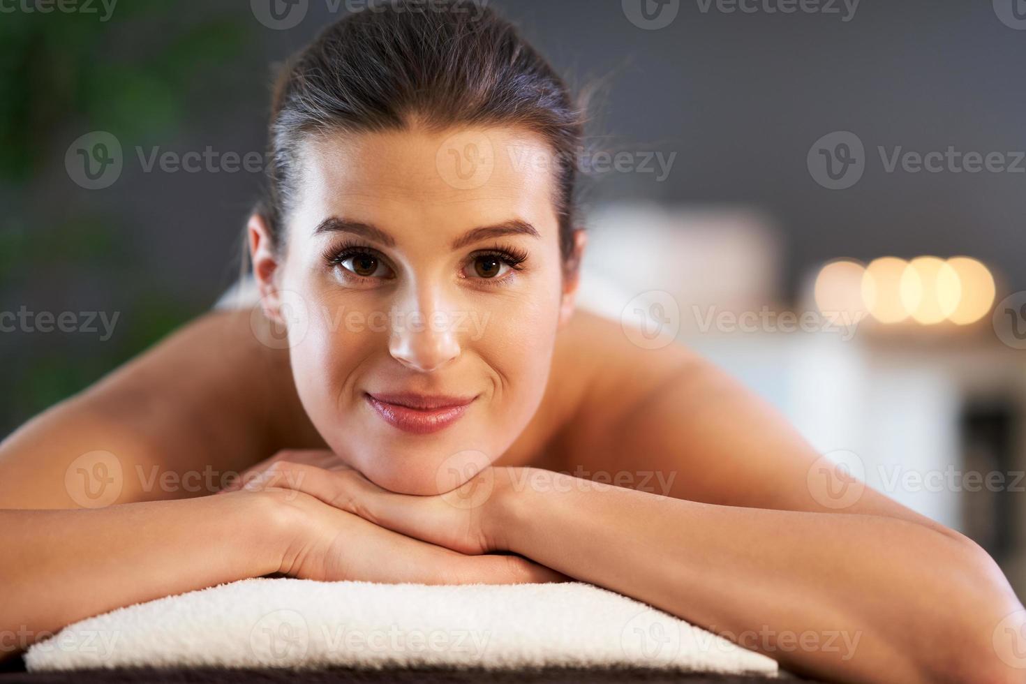 Relaxed woman receiving back massage 15858491 Stock Photo at Vecteezy
