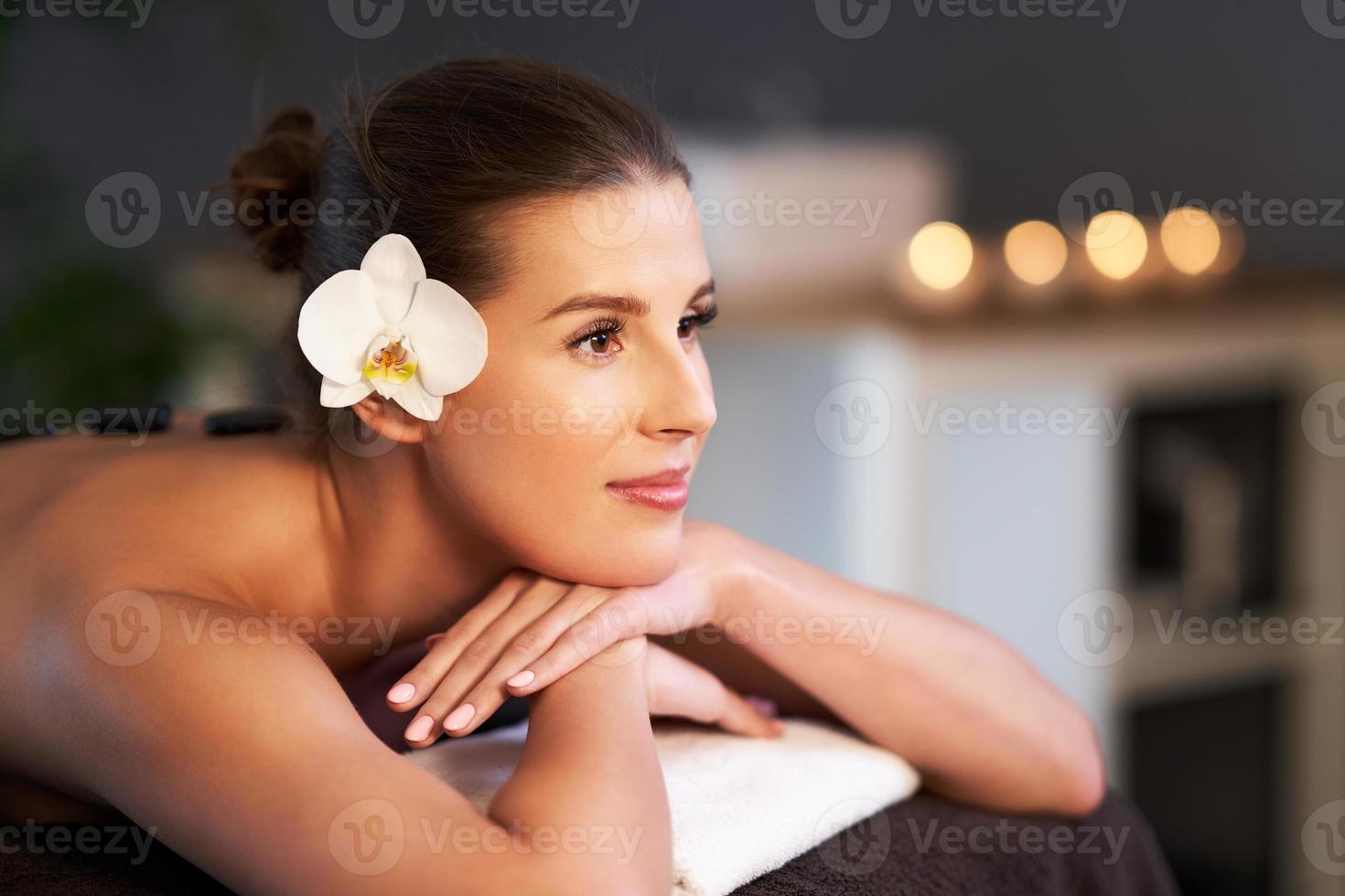 Relaxed woman receiving back massage 15858494 Stock Photo at Vecteezy