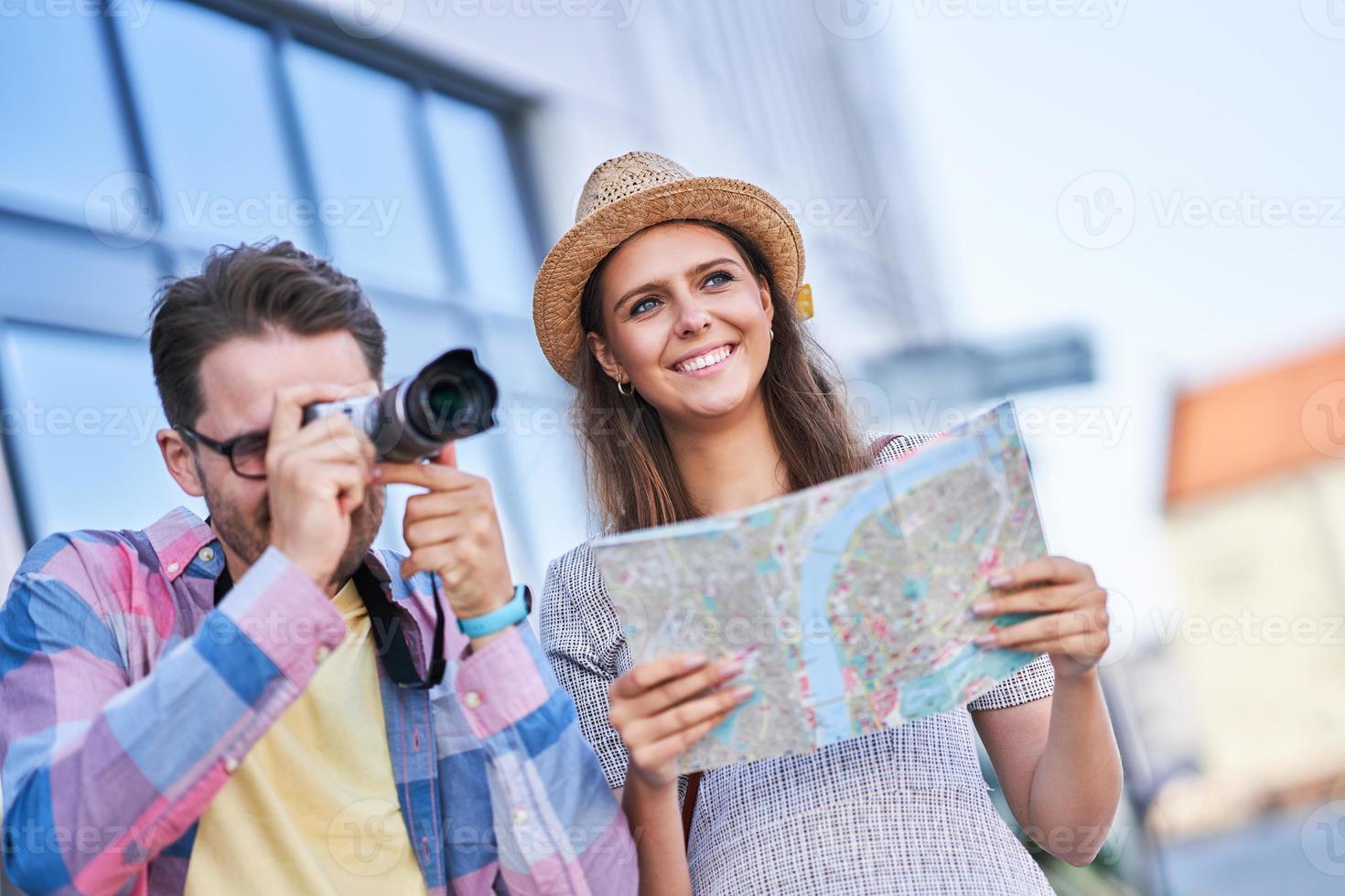 Adult happy tourists sightseeing Gdansk Poland in summer photo