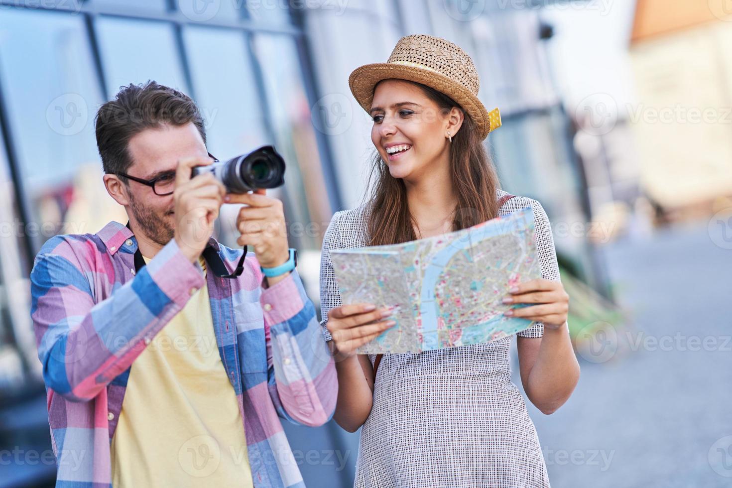 Adult happy tourists sightseeing Gdansk Poland in summer photo