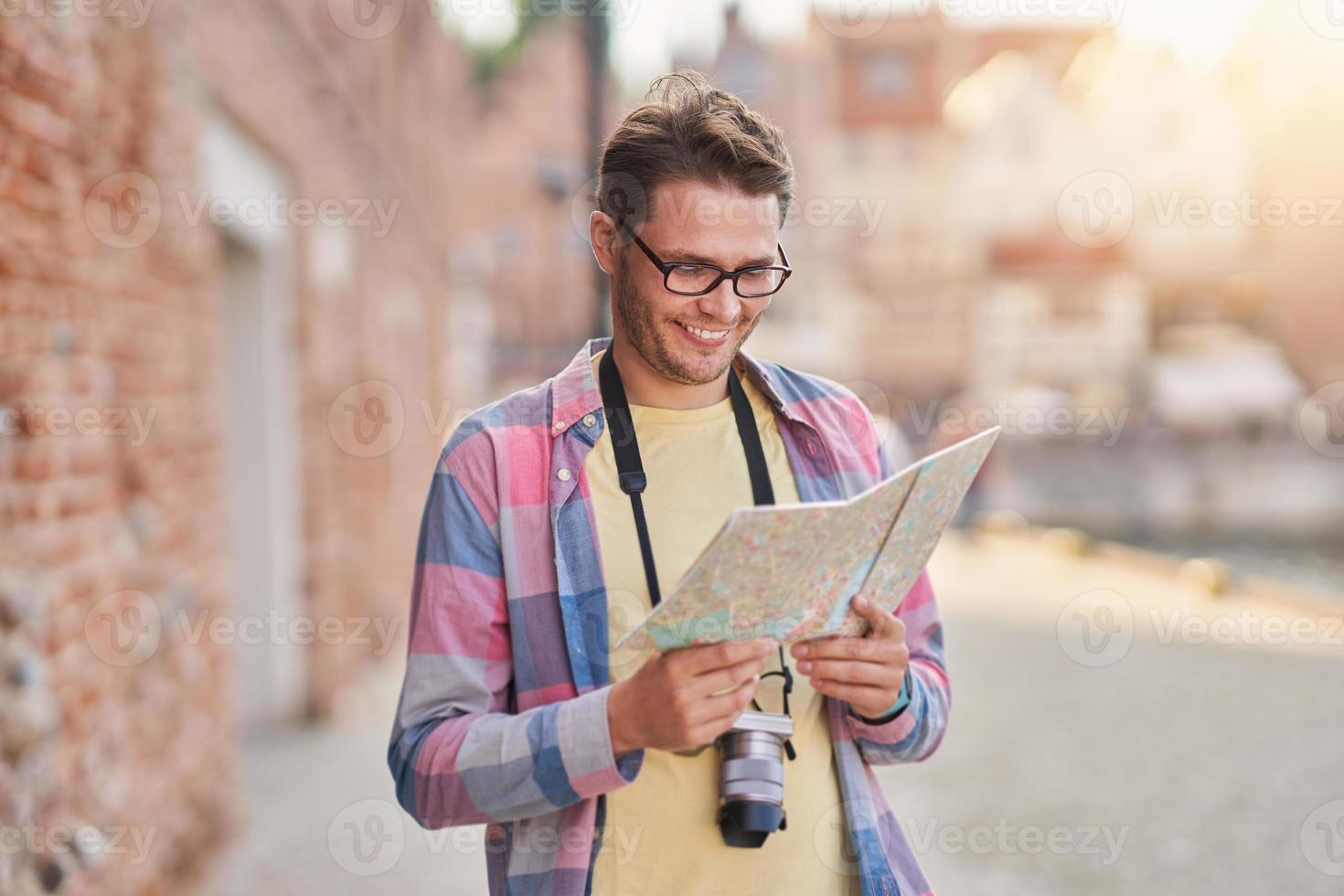 Male tourist in mask sightseeing Gdansk Poland photo