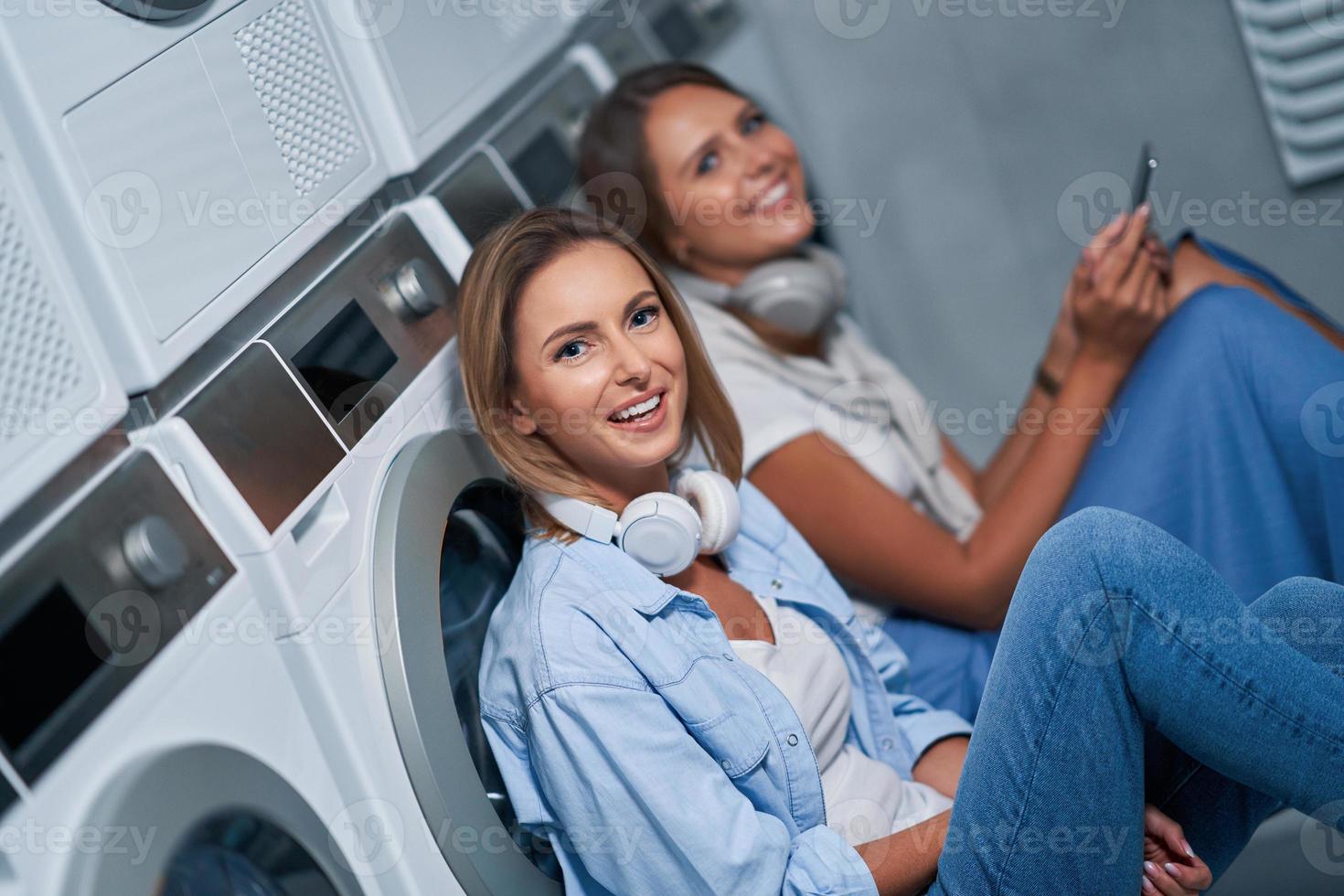 Two students in laundry room photo
