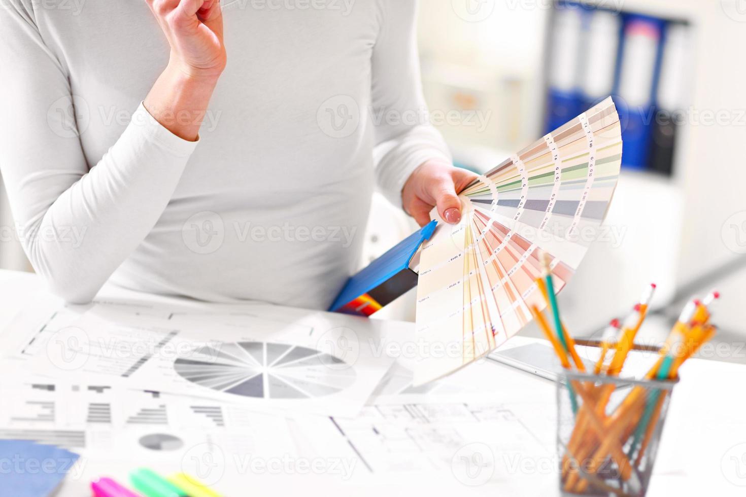 Woman working in her home office photo