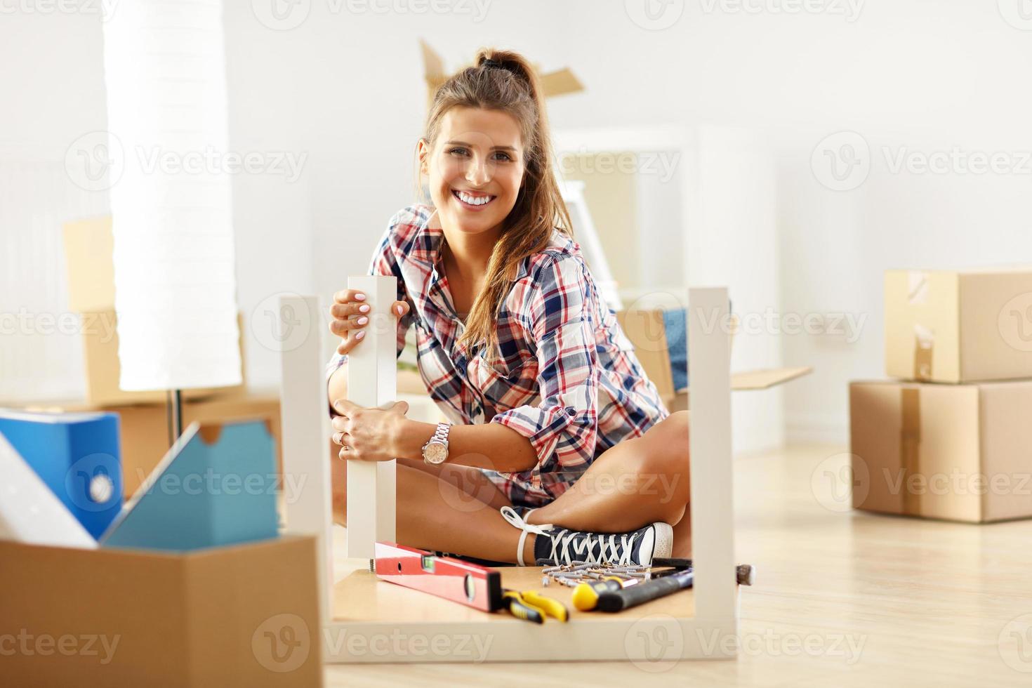 Happy adult couple moving out or in to new home photo