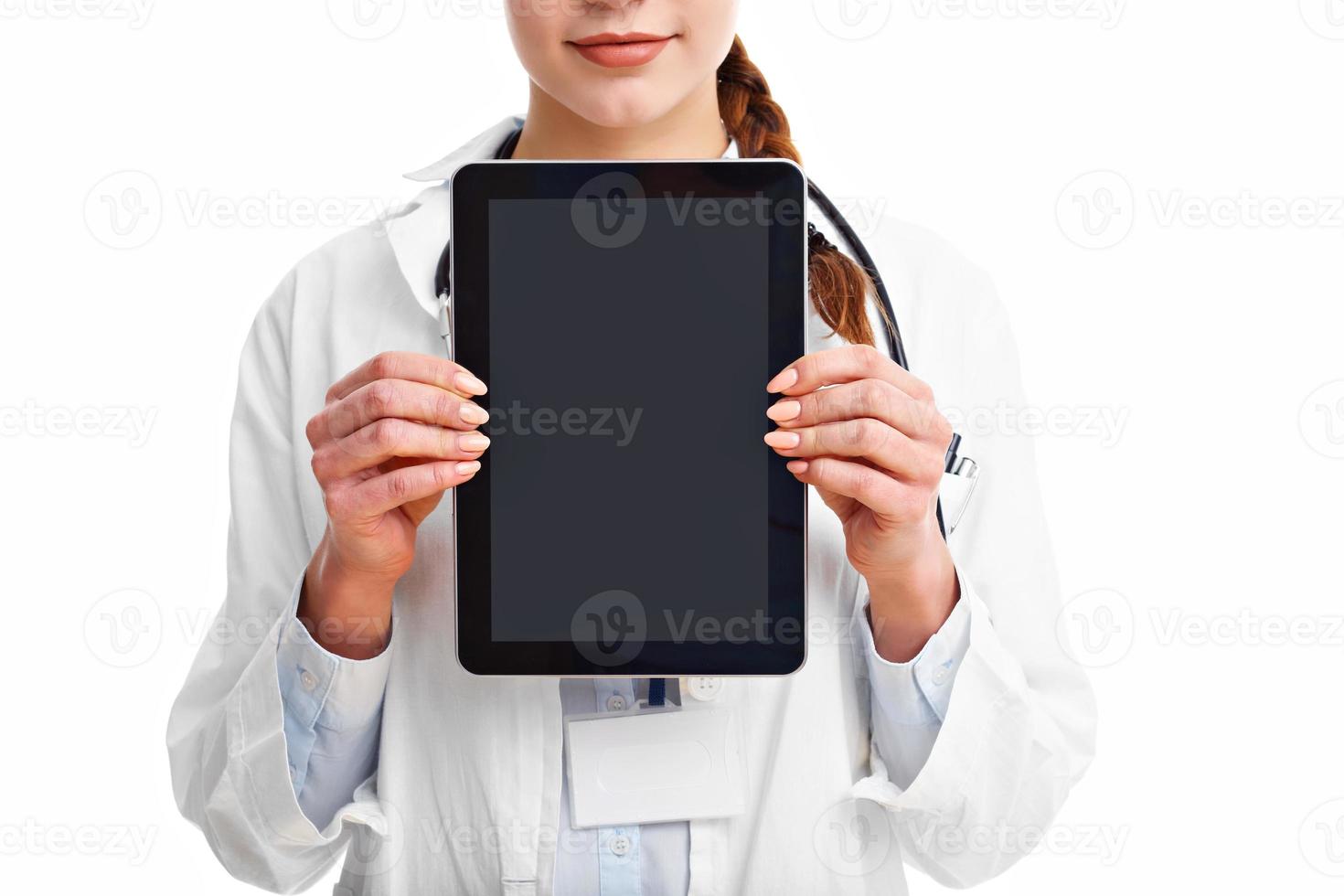 Woman doctor isolated over white background photo