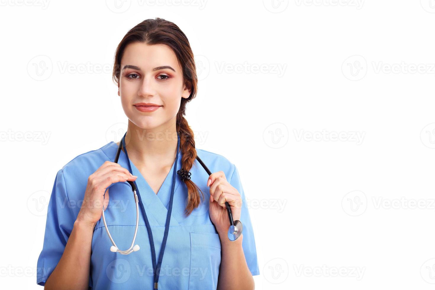 Woman doctor isolated over white background photo