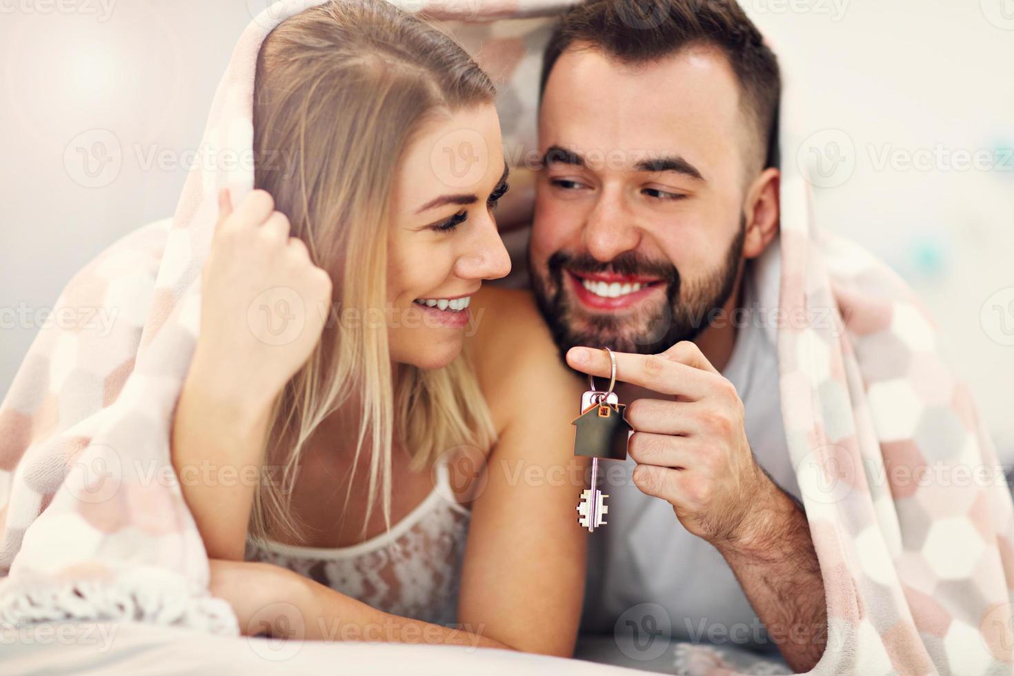 Adult attractive couple in bed photo