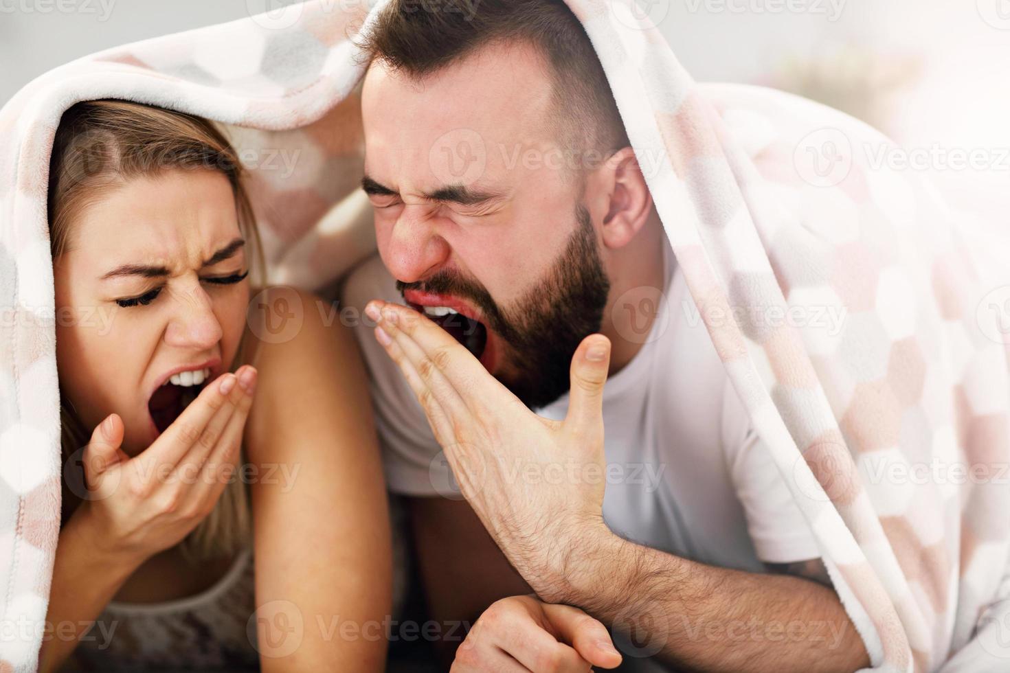 Adult attractive couple in bed photo