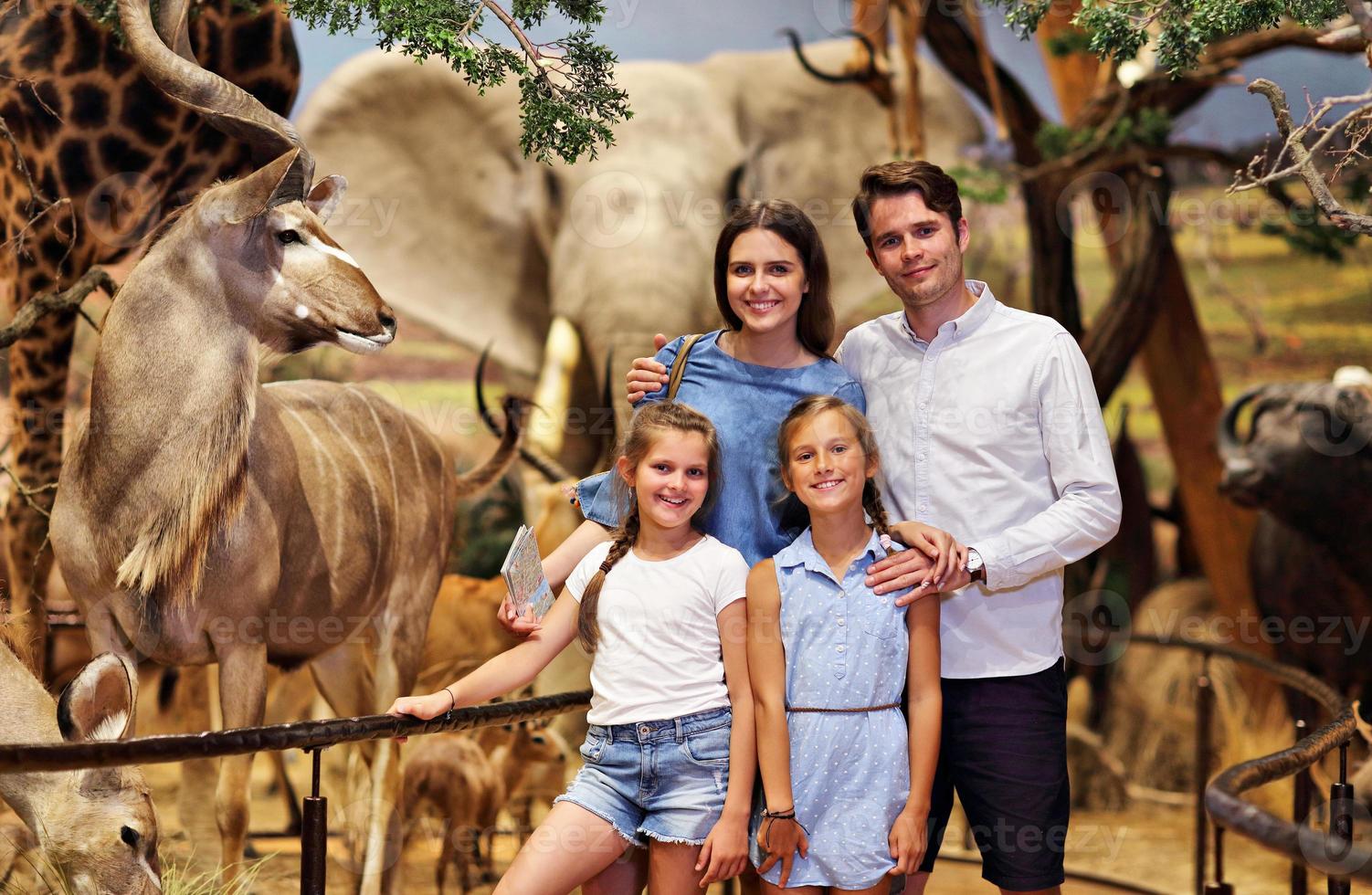 Joyful family in nature museum photo