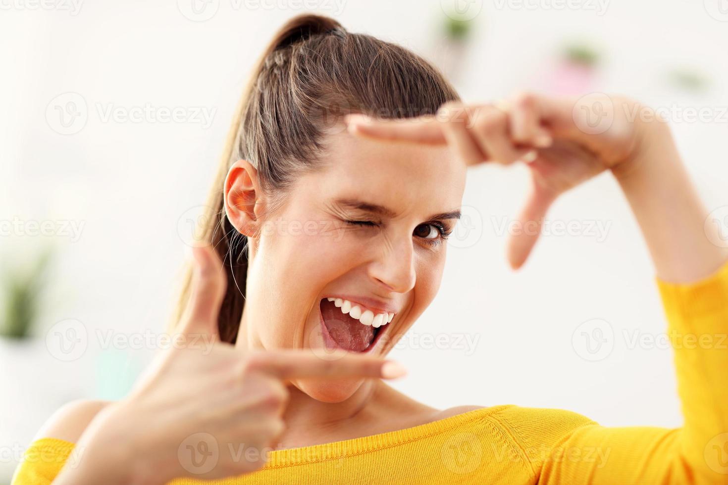 Happy woman relaxing at home photo