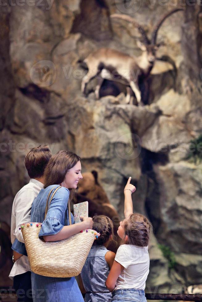 Joyful family in nature museum photo