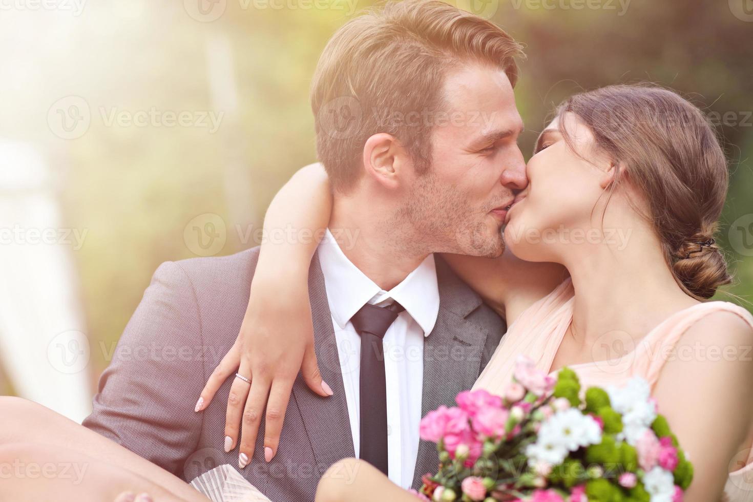 Beautiful wedding couple enjoying wedding photo
