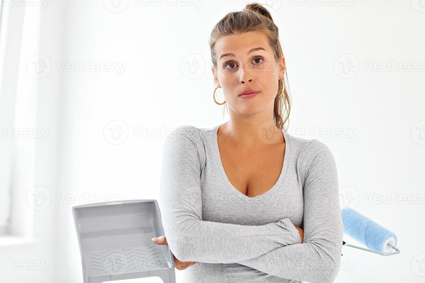 Mature woman doing home improvements photo
