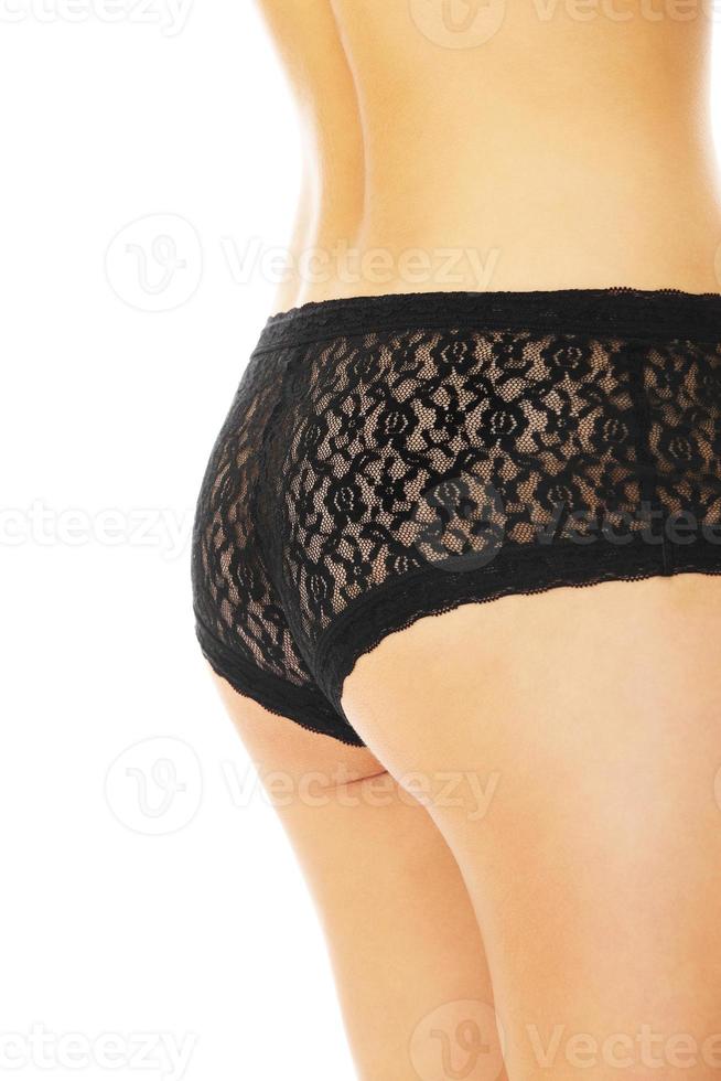 Female ass wearing black panties against white background 4521880 Stock  Photo at Vecteezy