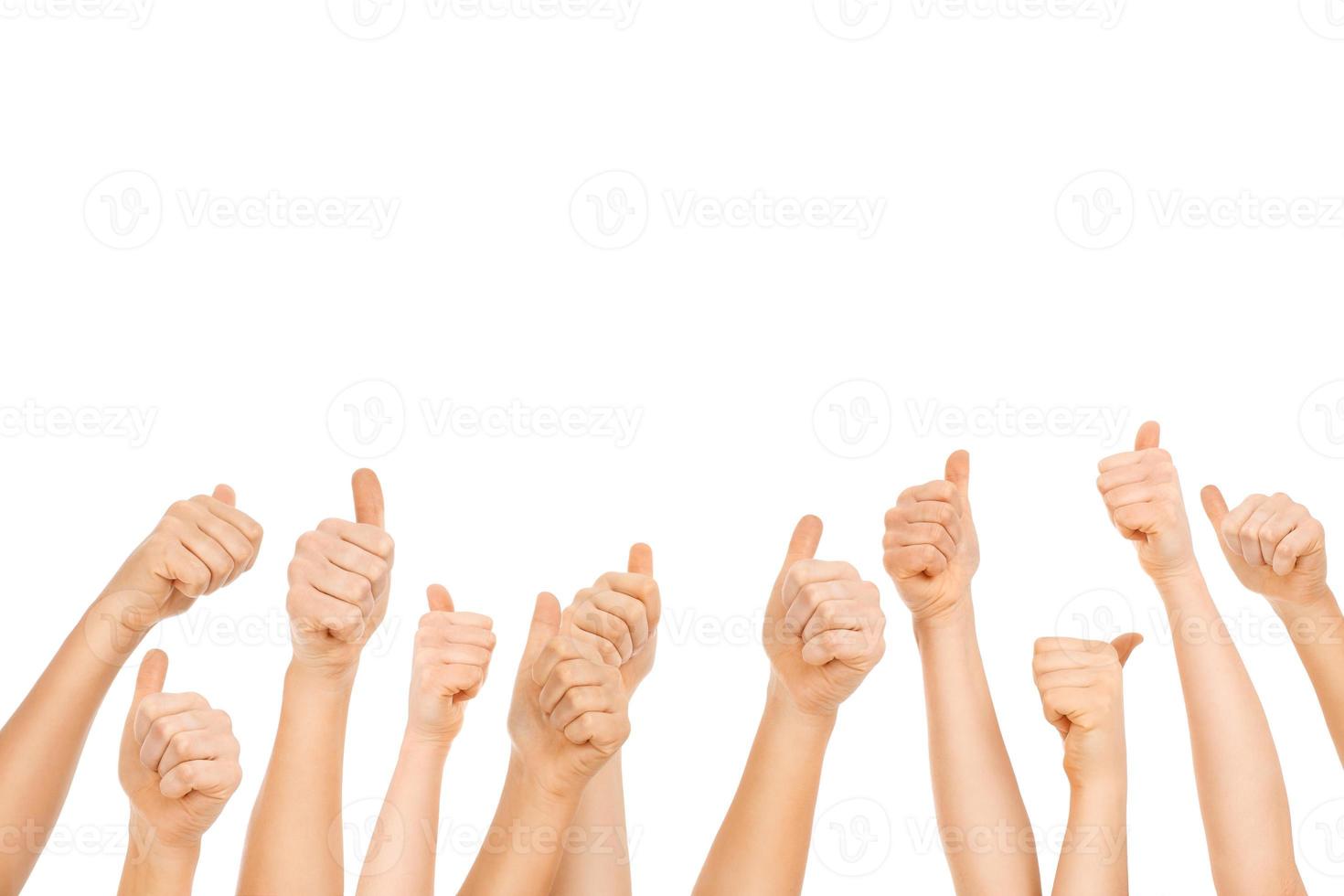 Thumbs up on white background photo