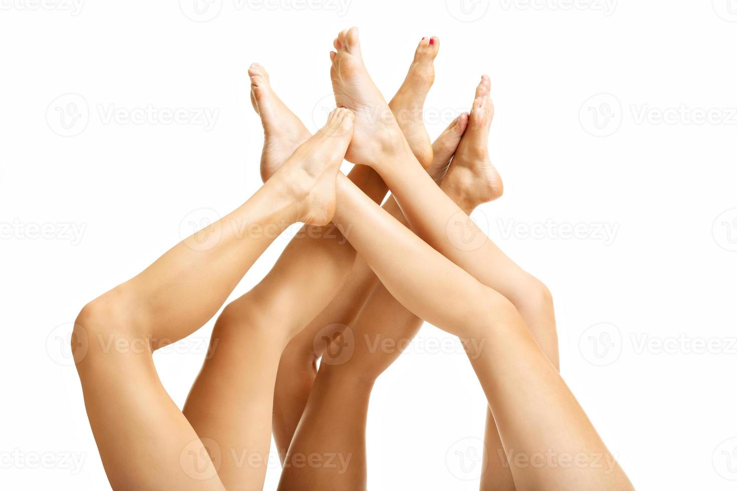 Female legs on white background photo