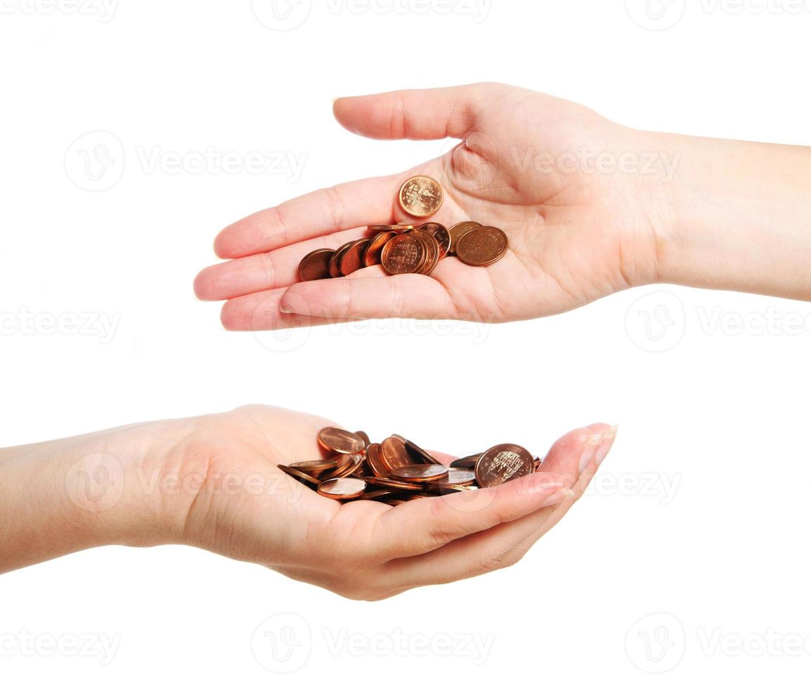 Money transfer with hands and coins photo