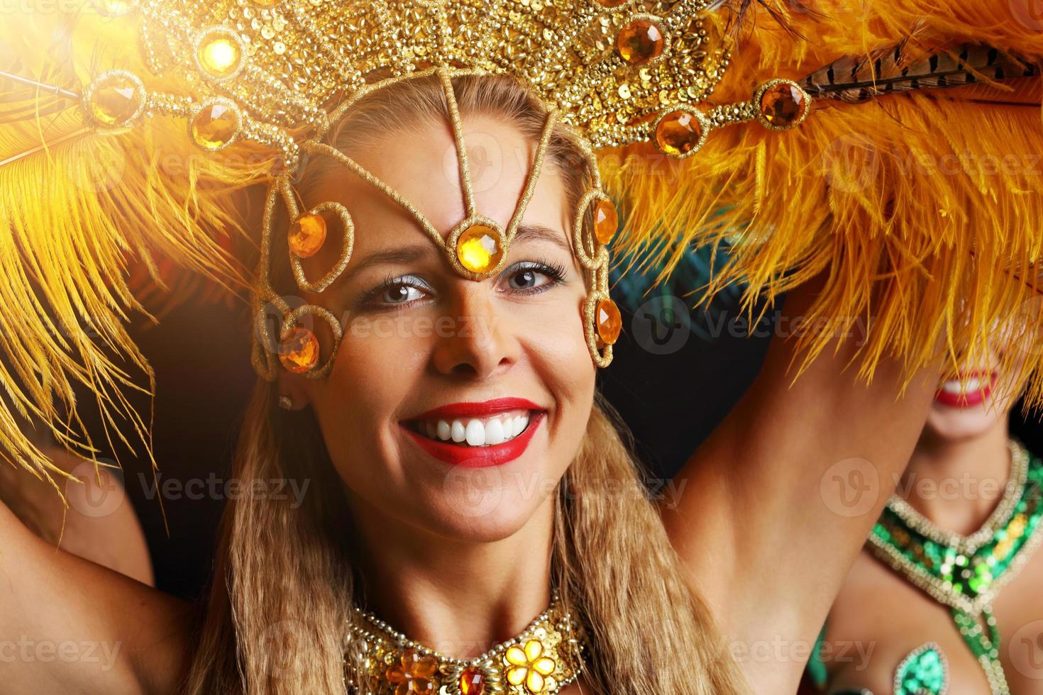 Brazilian women dancing samba at carnival photo