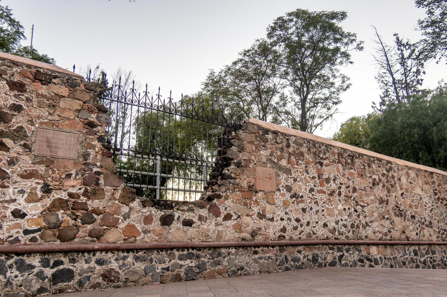 Santiago de Queretaro Mexico November 09, 2022 Wall of Convent of the Cross with Cannon Shot photo