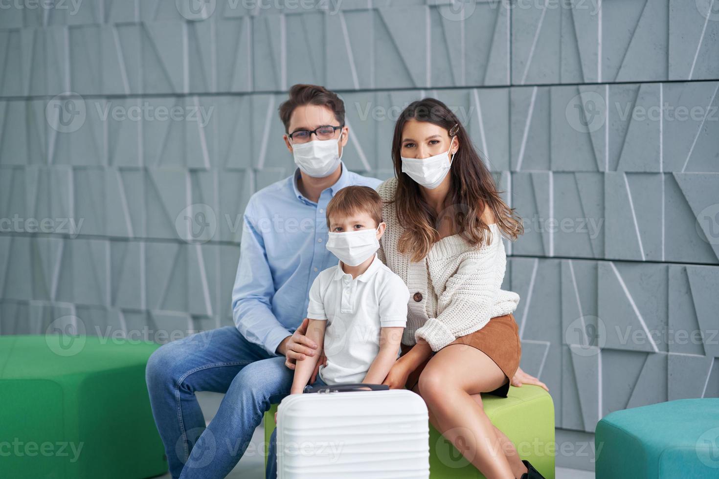 Picture of family waiting in hotel lobby photo