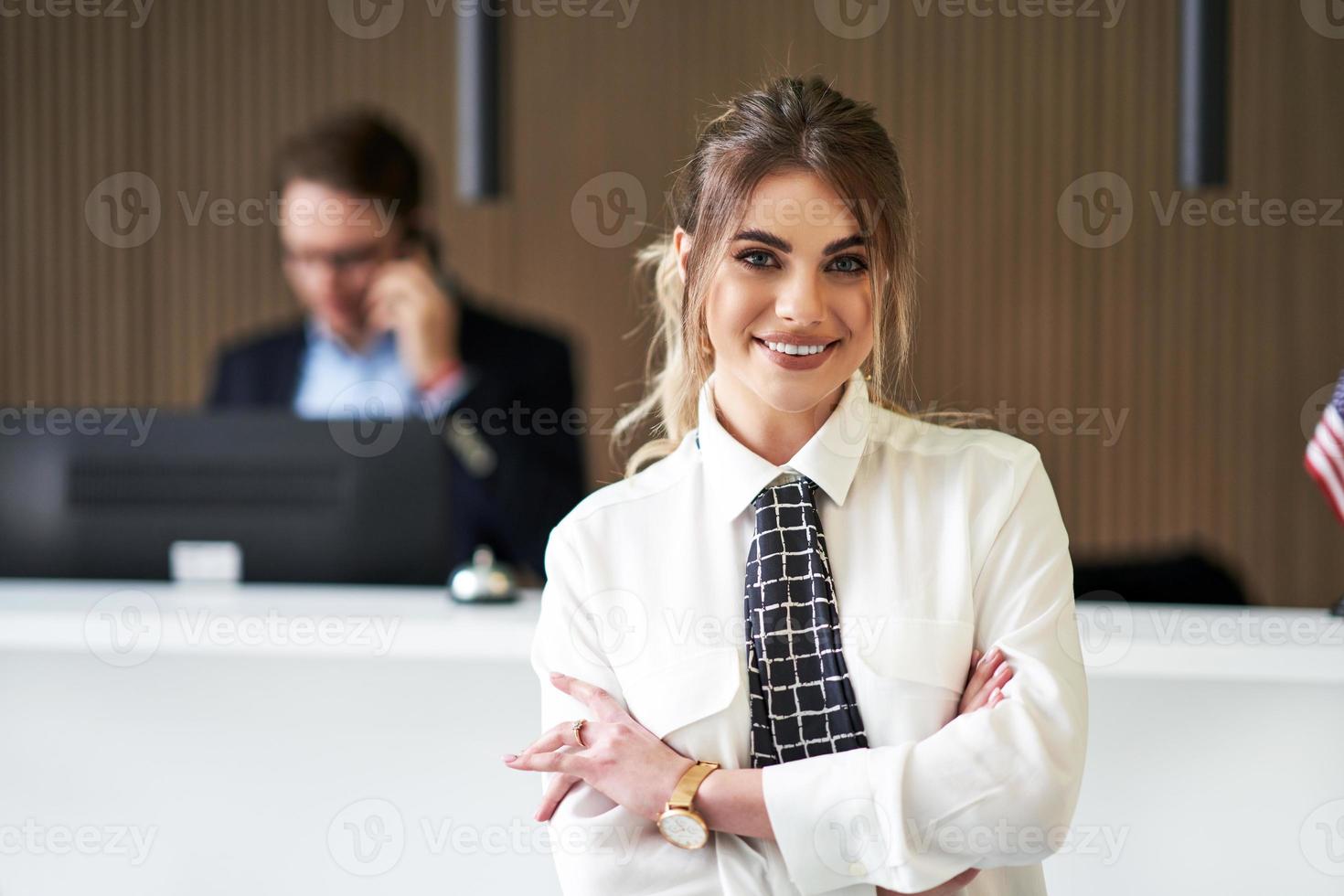 Receptionist working in a hotel photo