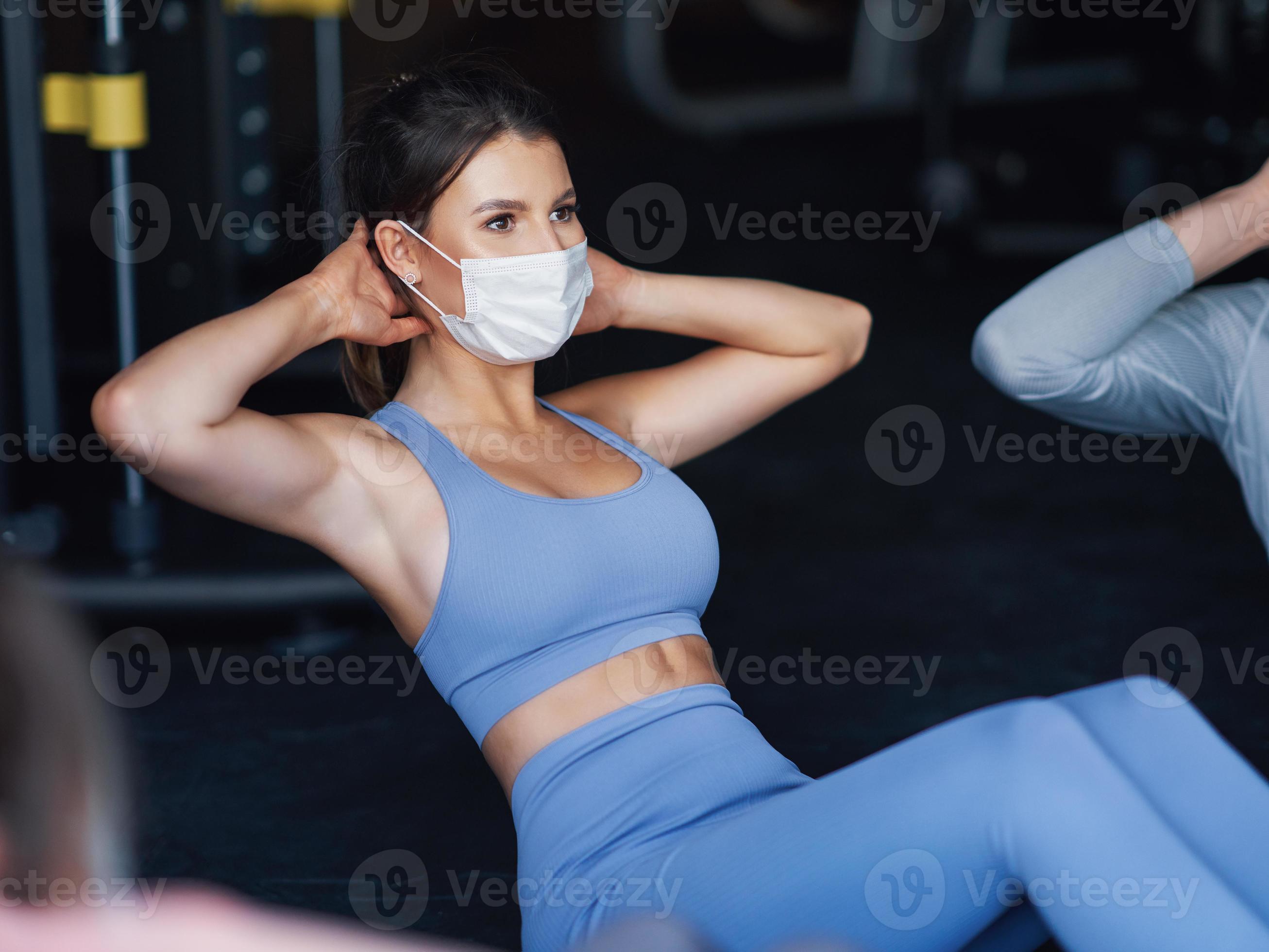 Group of people wearing masks working out in a gym 15866690 Stock Photo