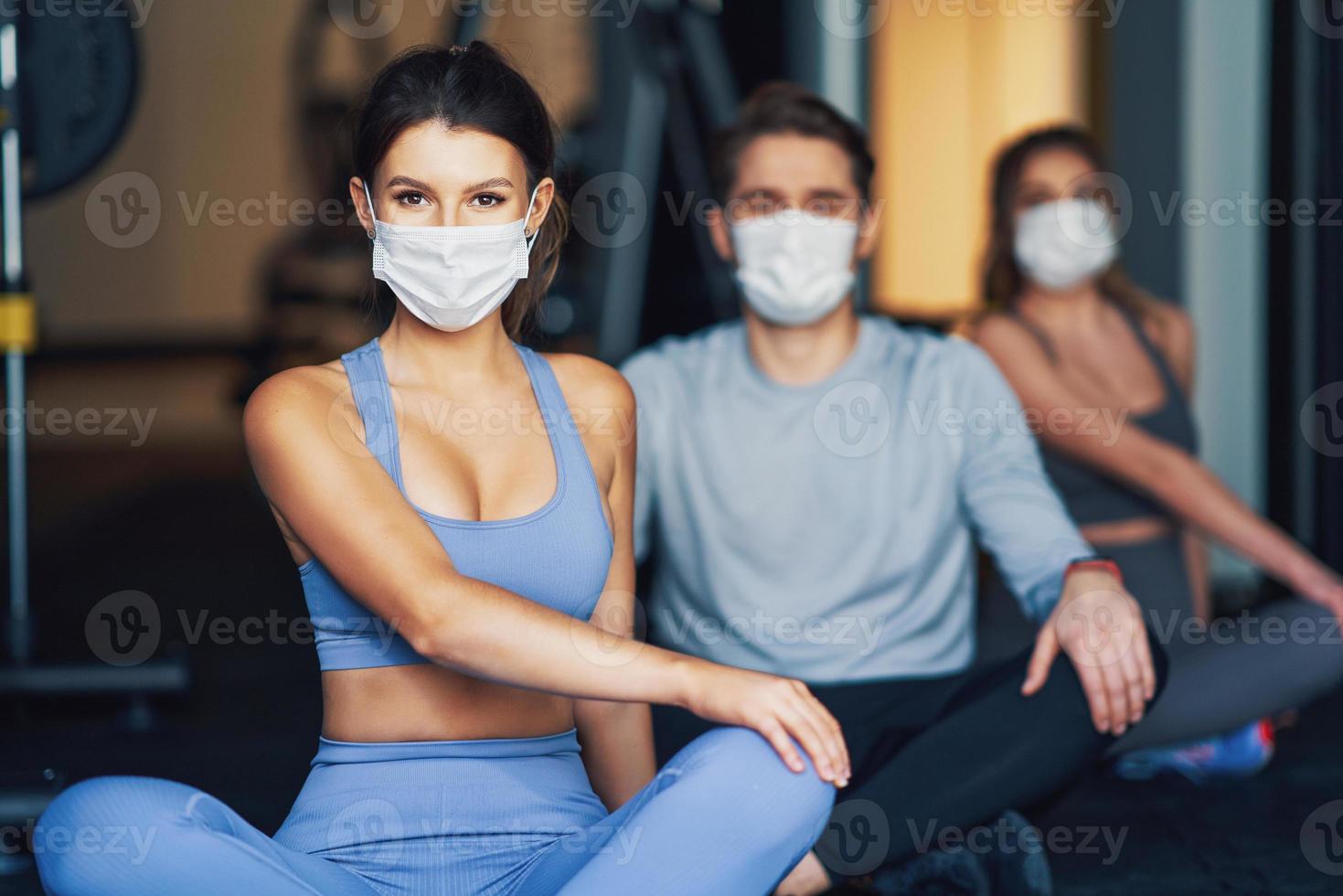Group of people wearing masks working out in a gym 15866702 Stock Photo