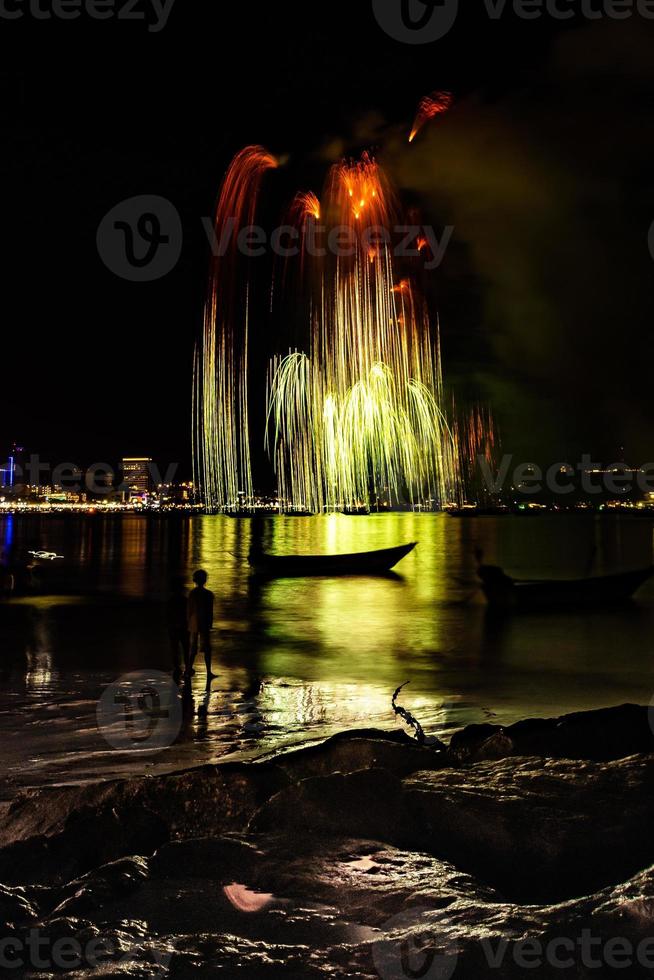 Abstract colored firework background light up the sky with dazzling display photo