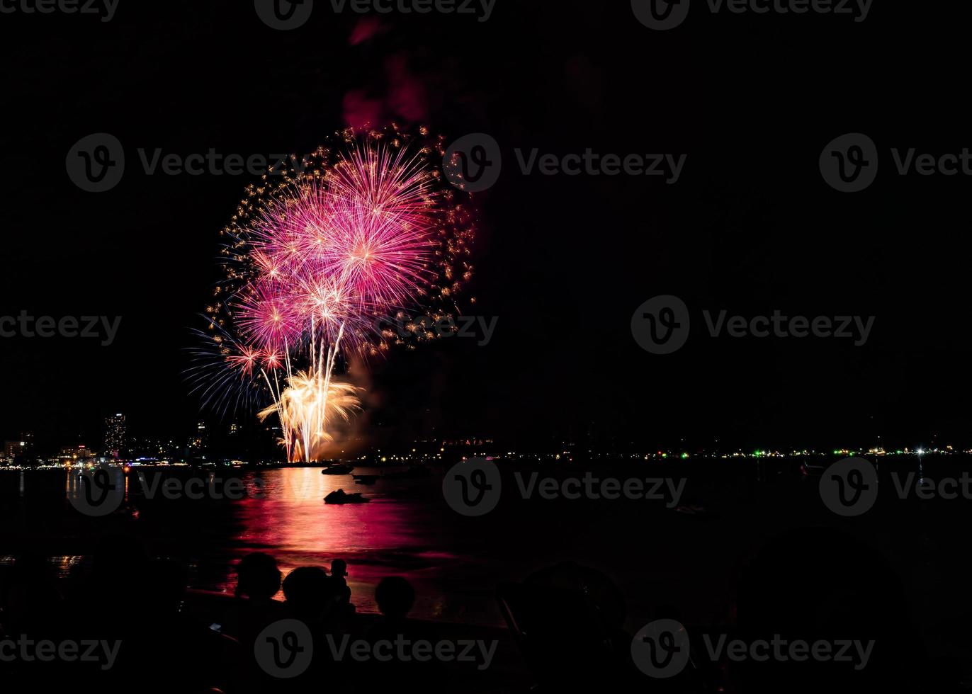 Abstract colored firework background light up the sky with dazzling display photo