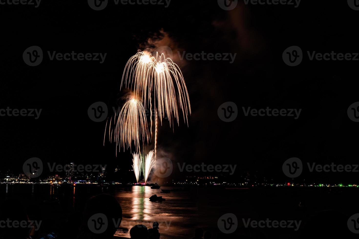 Abstract colored firework background light up the sky with dazzling display photo