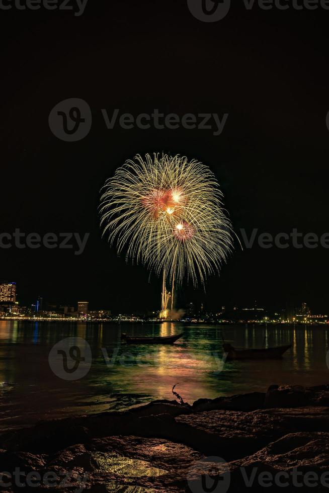 Abstract colored firework background light up the sky with dazzling display photo
