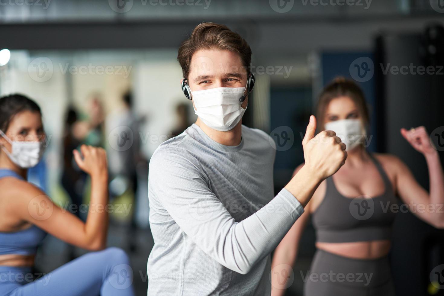 Group of people wearing masks working out in a gym 15867482 Stock Photo