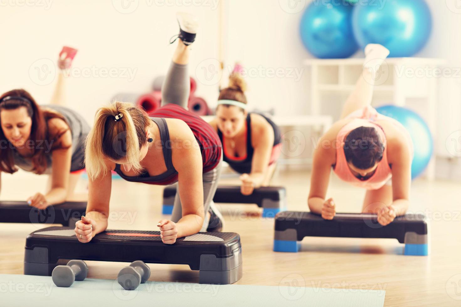 Group of pregnant women during fitness class photo