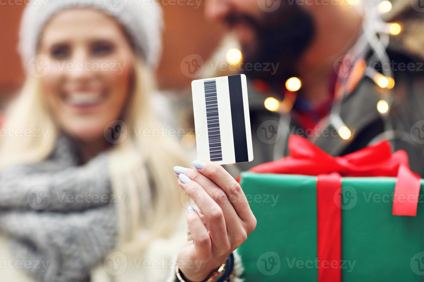 Picture of couple shopping for Christmas in the city photo