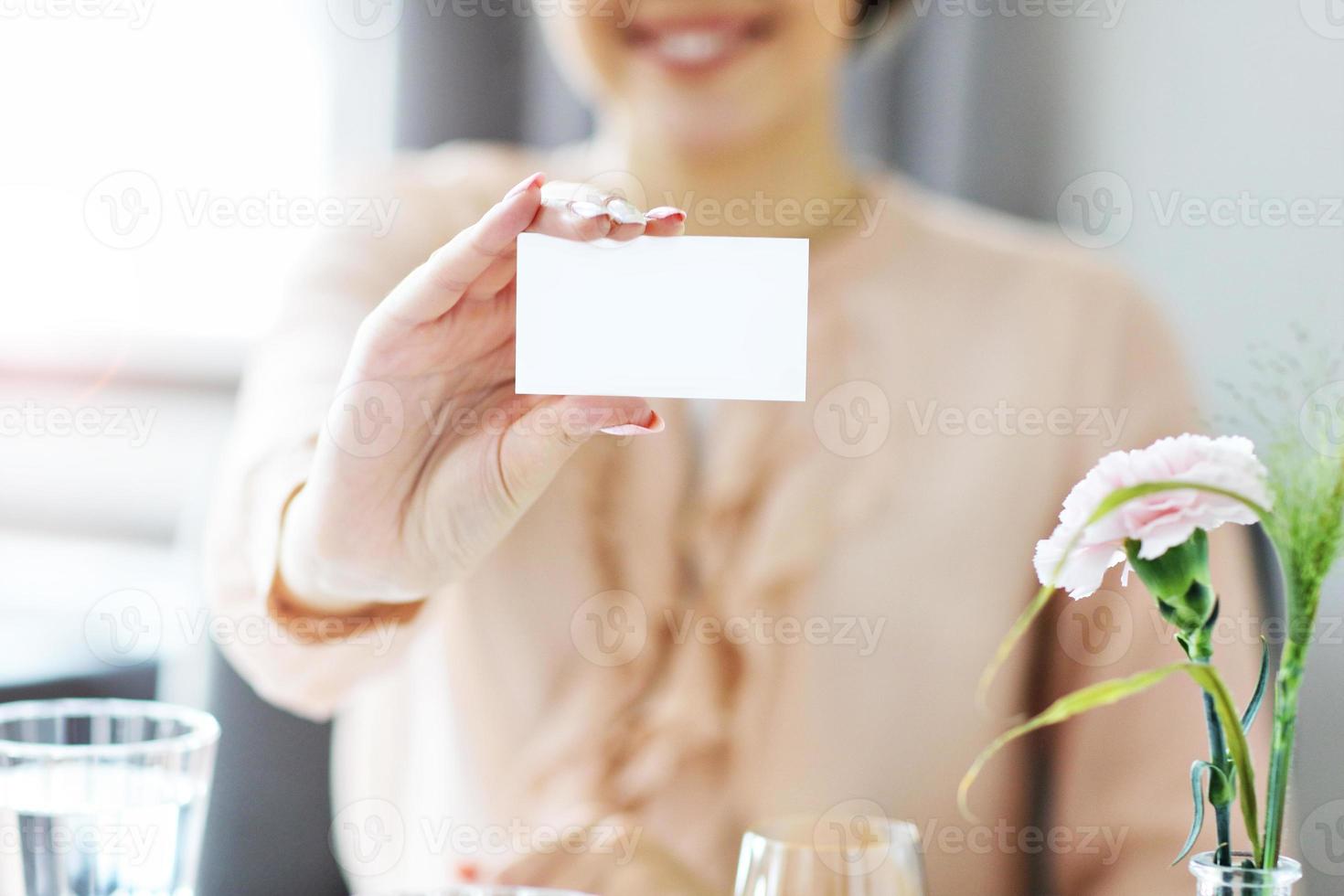 Two Businesspeople Meeting For Lunch In Restaurant photo