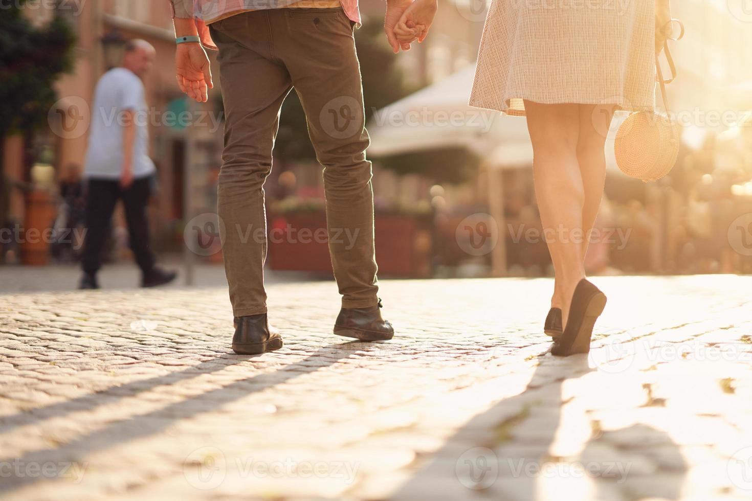 Downsection of tourists sightseeing during summer holidays photo