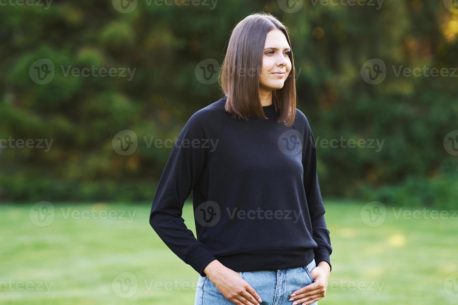 Young woman in black blouse photo