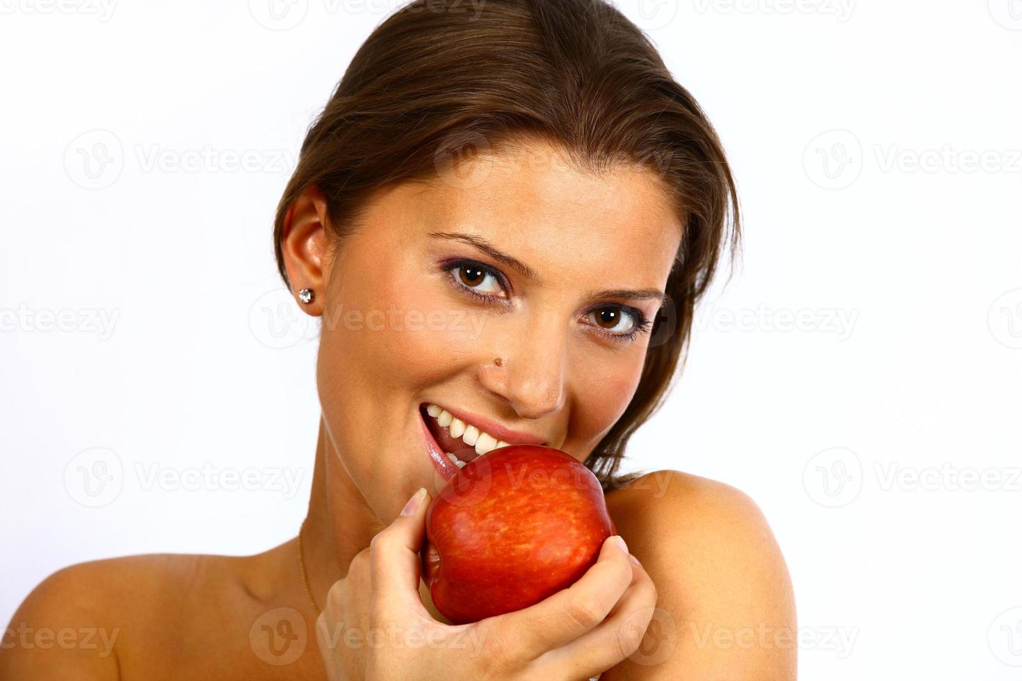 Woman holding apple photo