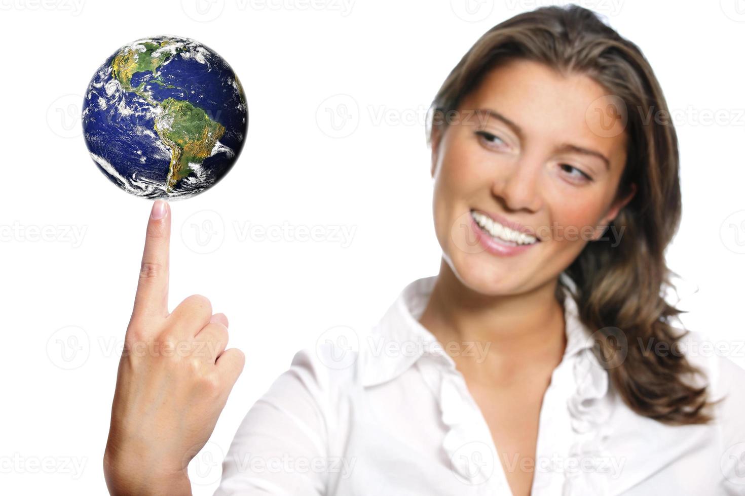 Beautiful young woman and the Earth photo