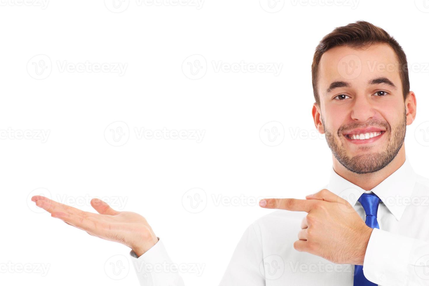 Businessman pointing at something photo