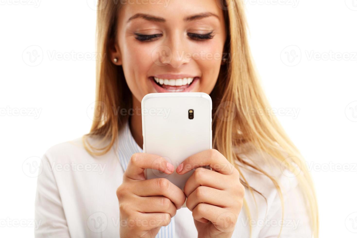 Portrait of Beautiful Young Business woman using mobile phone isolated on white background photo