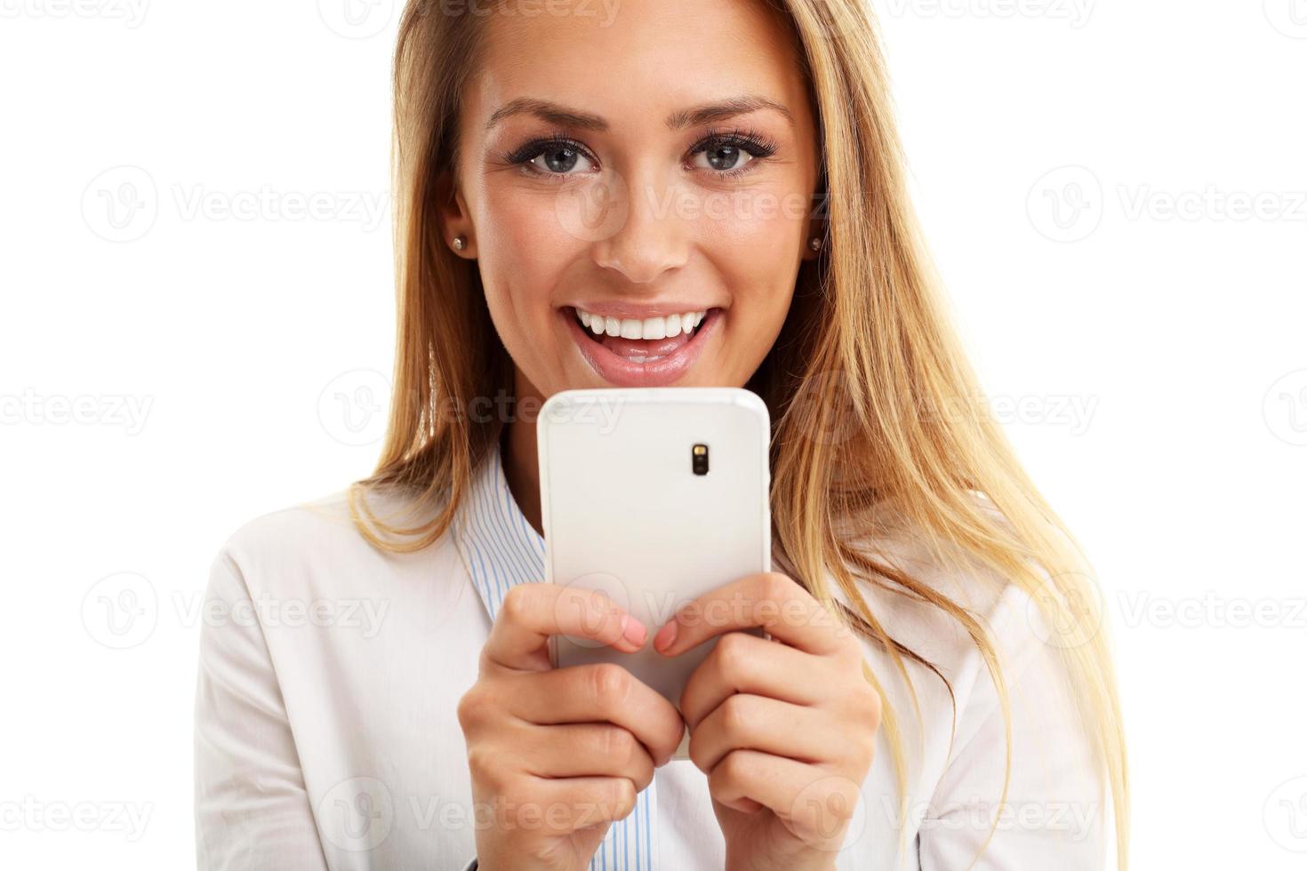 Portrait of Beautiful Young Business woman using mobile phone isolated on white background photo