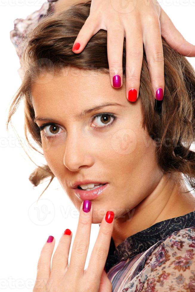 Trendy woman with colorful nails photo