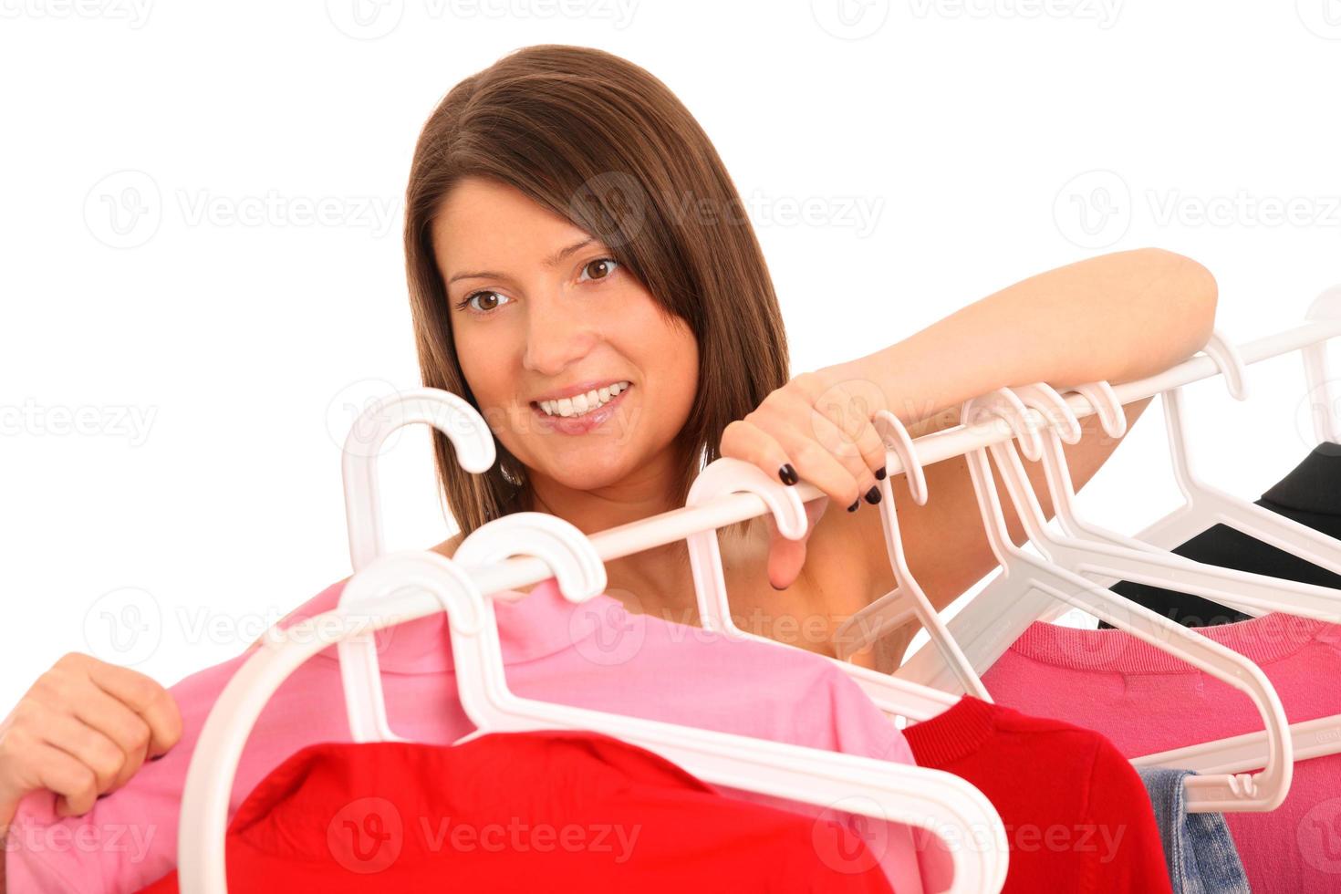 Surrounded by clothes photo