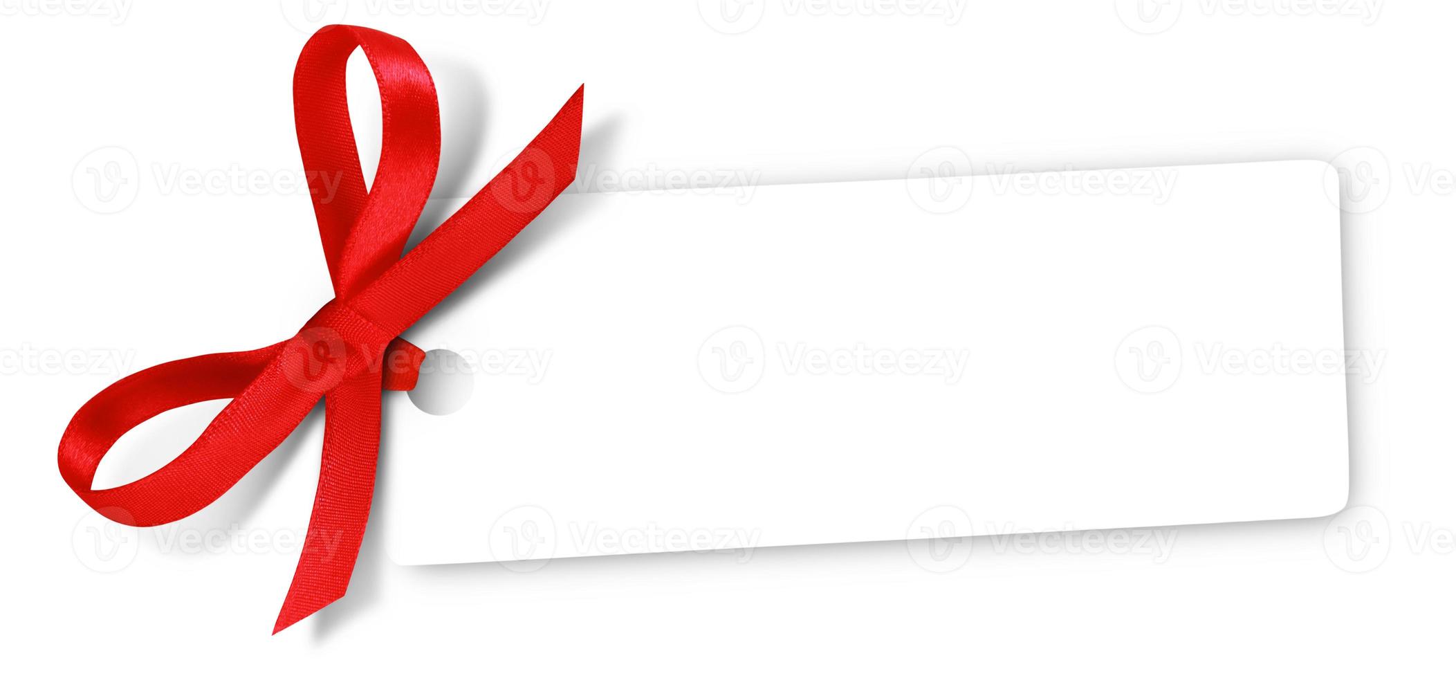 Gift card note with ribbon on isolated background photo