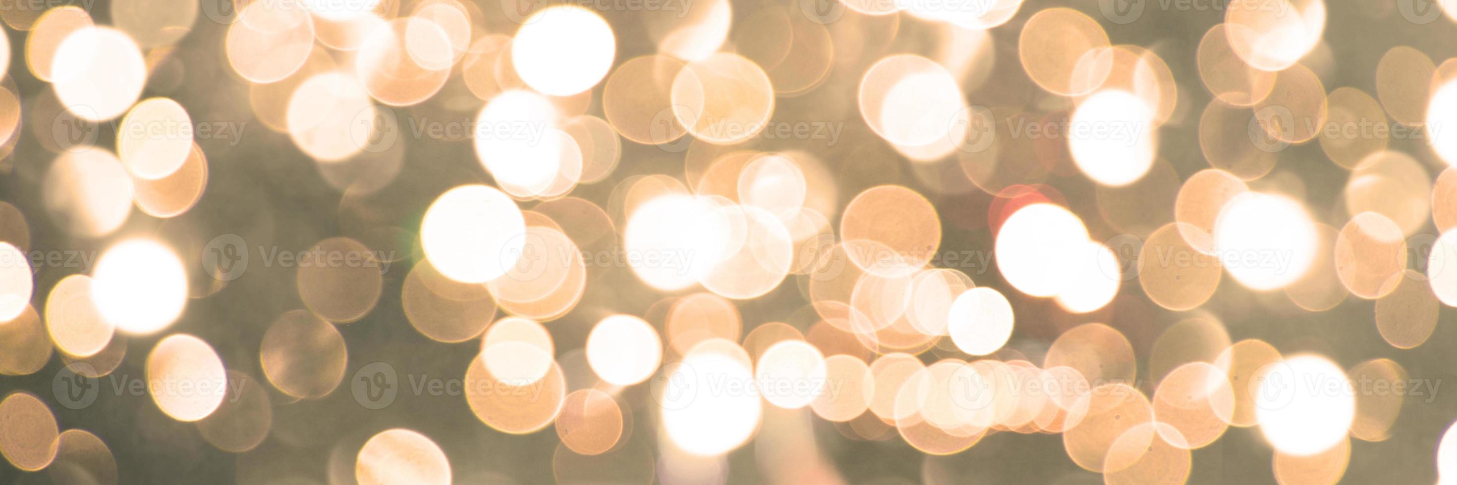 Sparkling lights, bokeh festive background with texture. photo